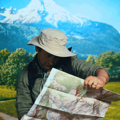 Lost traveler looking at map